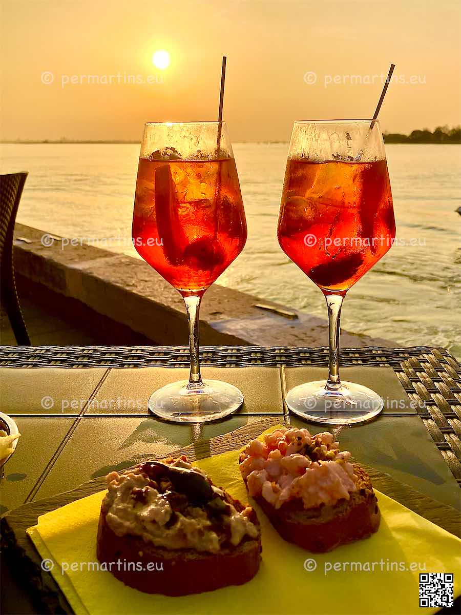 Burano Italy two drinks sunset romantic view