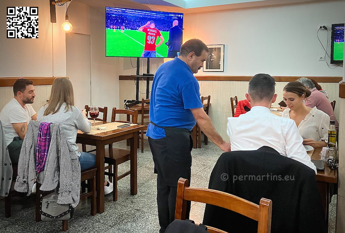 Portugal Lisbon waiter serving at O Cofre restaurant