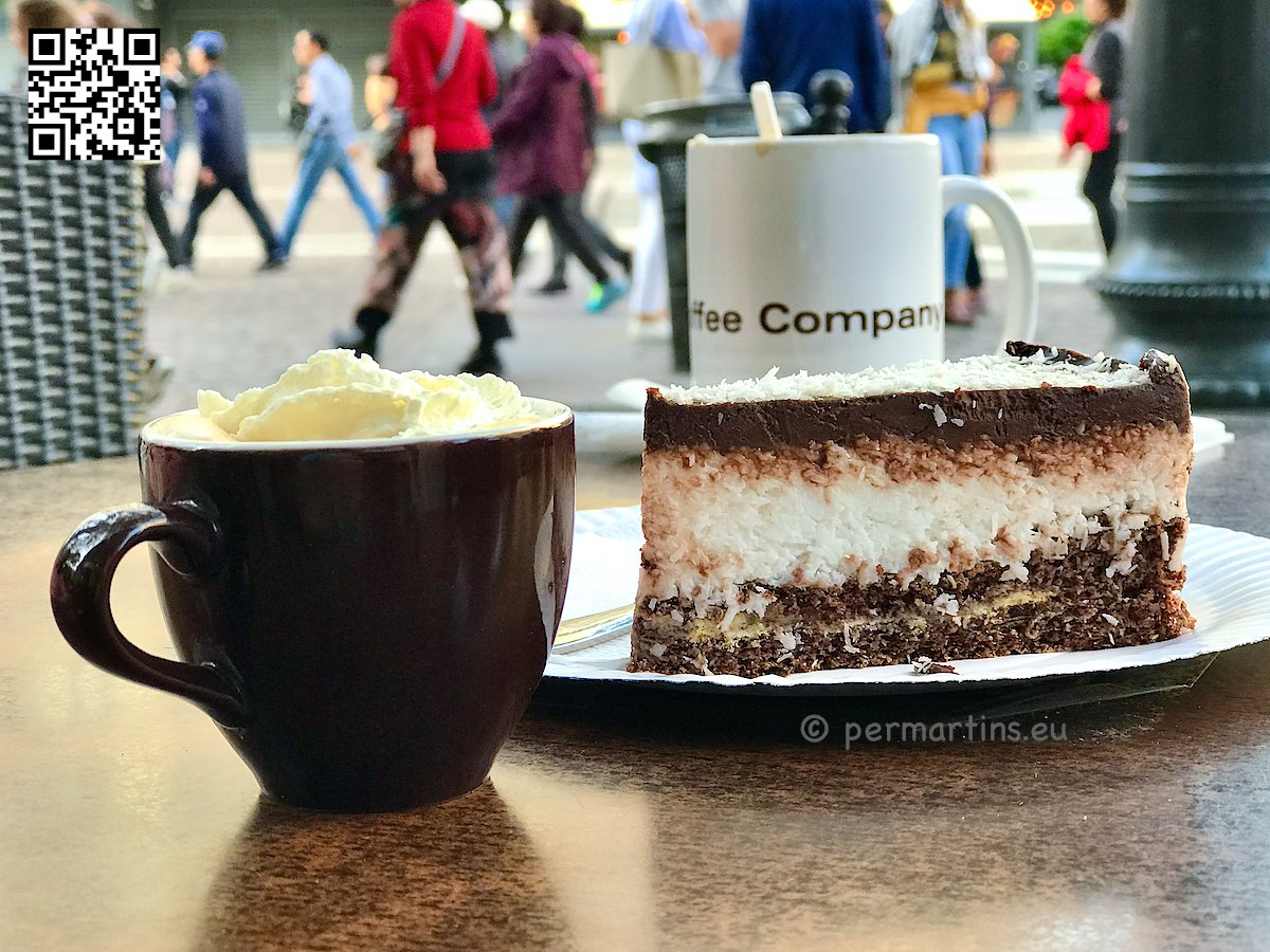 Hungary Budapest coffee with cream and a cake close up at the California Coffee Company