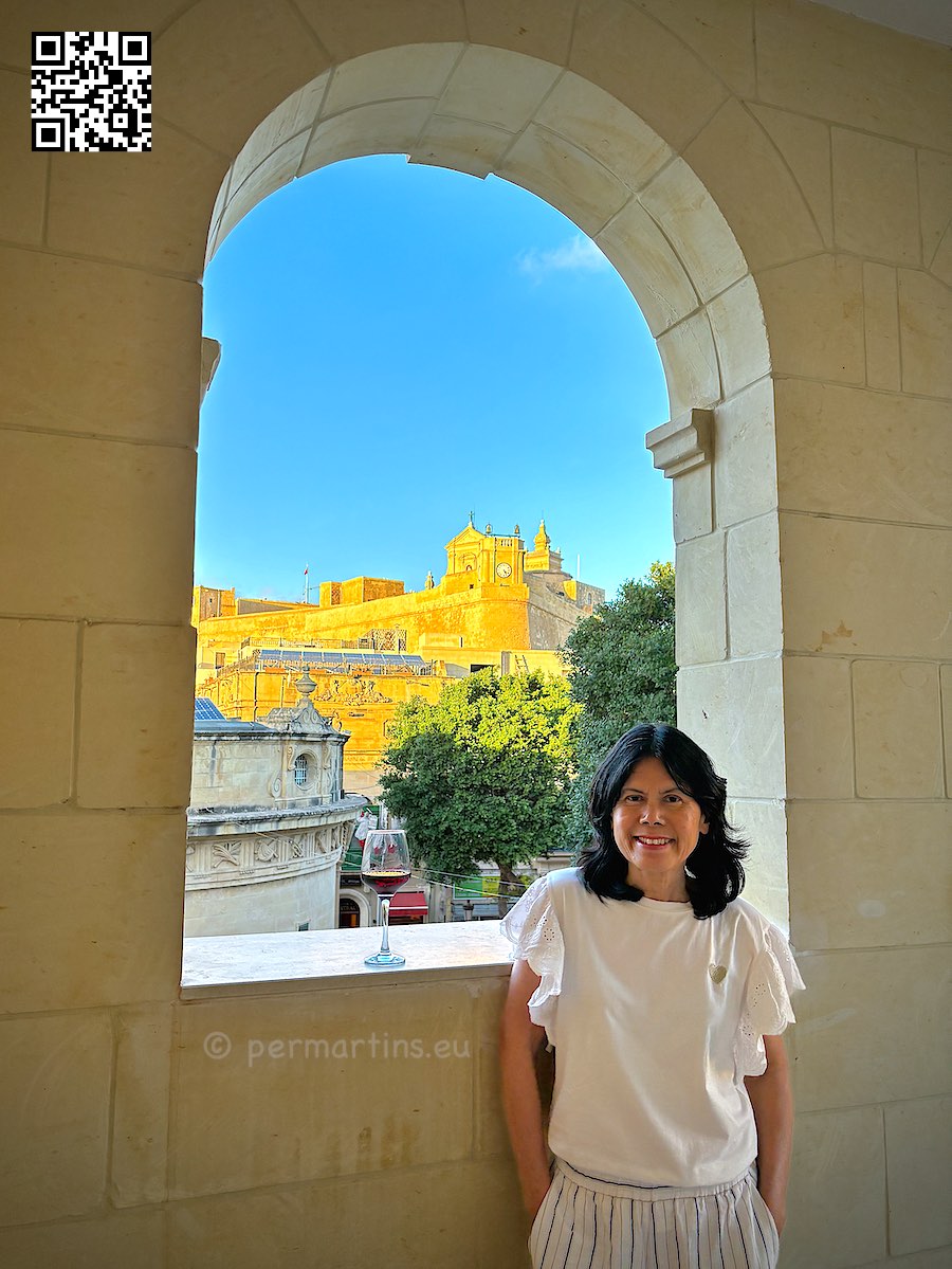 Malta Gozo Victoria woman at Provicario hotel Cittadella in background
