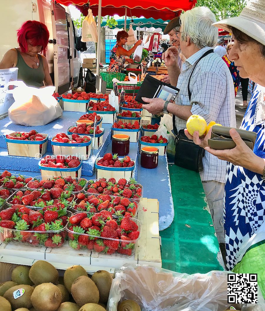 France Provence Arles out door market woman buying fruit