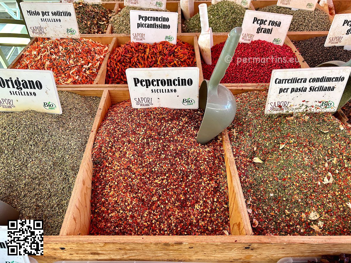 Italy Siracusa at Mercato di Ortigia many chili spices at Sapori Siciliani