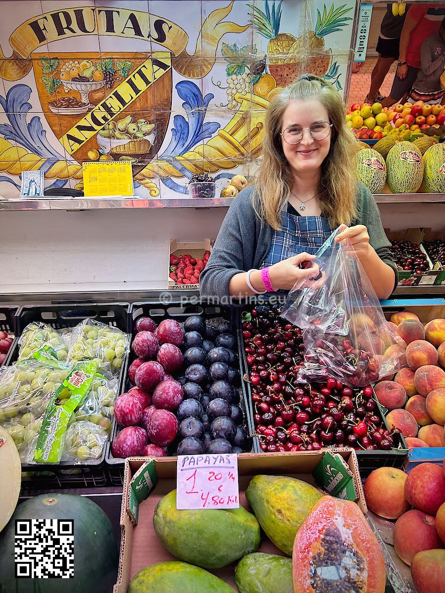 Spain Valencia Mercado Central seller packing cherries at Frutas Angelita 