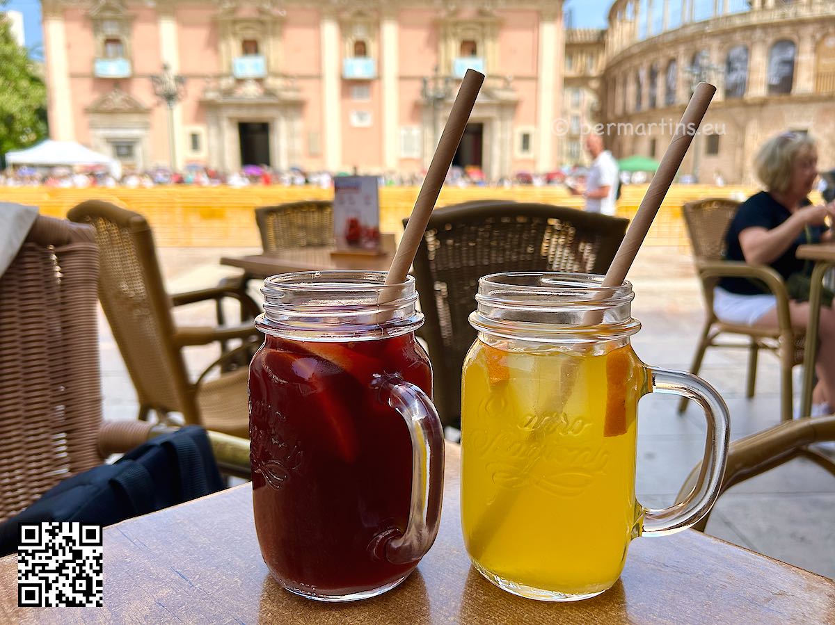 Spain Valencia two mugs of Sangria at Plaça de la Verge red and yellow color