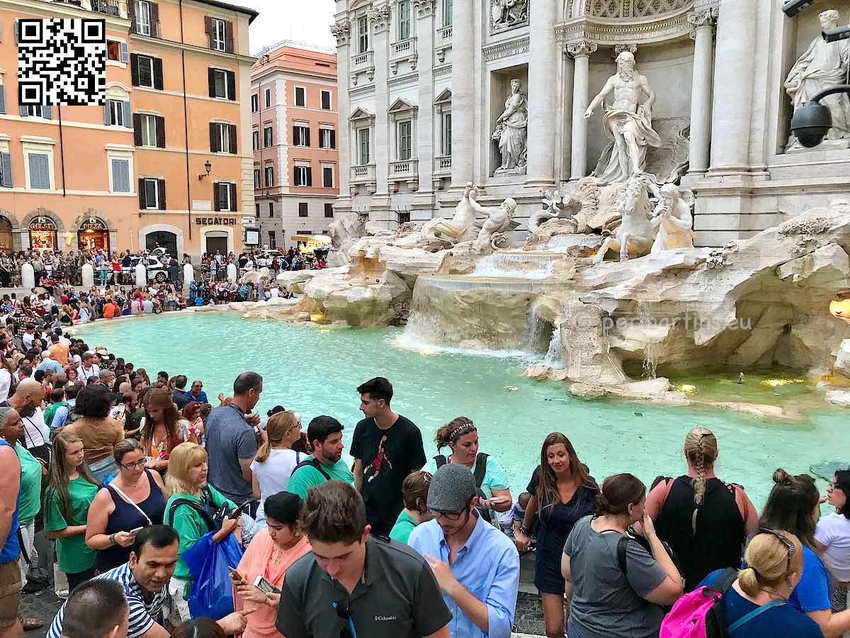 Italy Rome at the beautiful Fontana di Trevi many tourists 